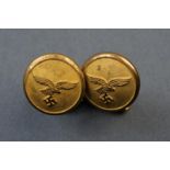 A pair of cufflinks of an air force officer