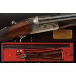 An elegant and rare cased Westley Richards double barreled single trigger gun