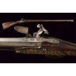 A flintlock gun by Bourboti-Rousset