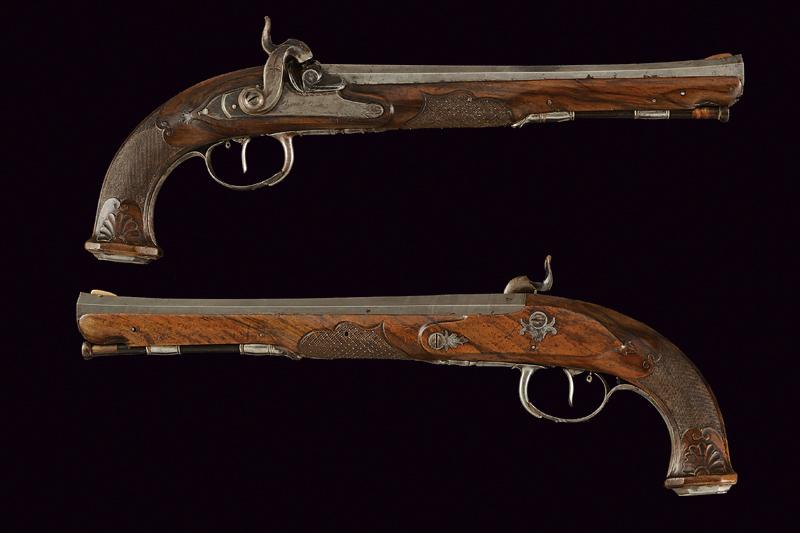 A pair of percussion pistols by Boutet, Directeur