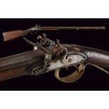 A double barrelled flintlock gun