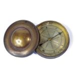 A brass compass