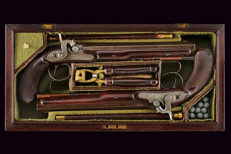 A pair of percussion pistols by Manton