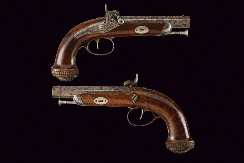 A pair of percussion pistols signed Odin