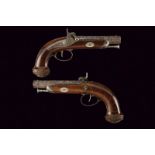 A pair of percussion pistols signed Odin