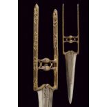 A gold-inlaid katar