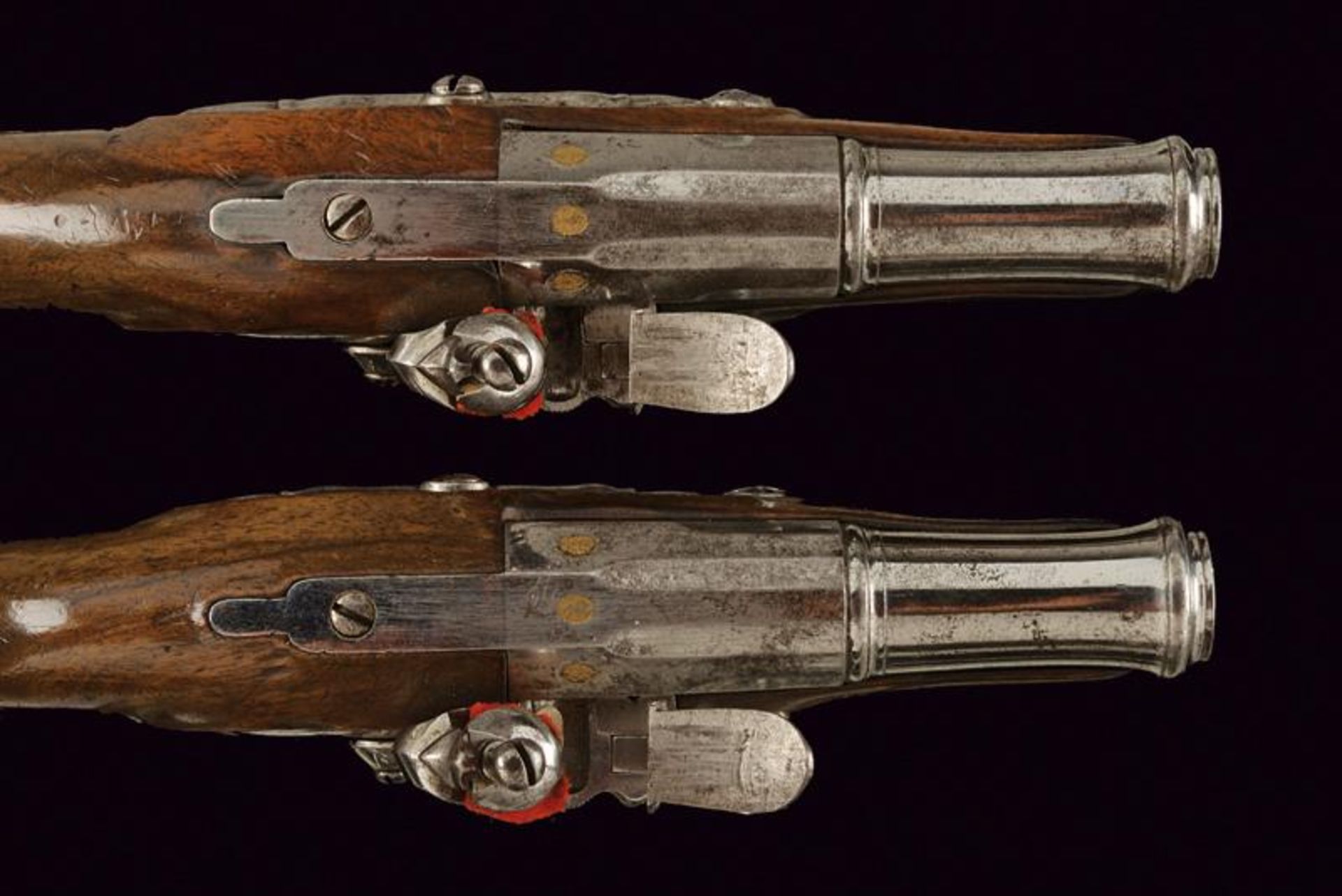 A pair of travel flintlock pistols signed Alary