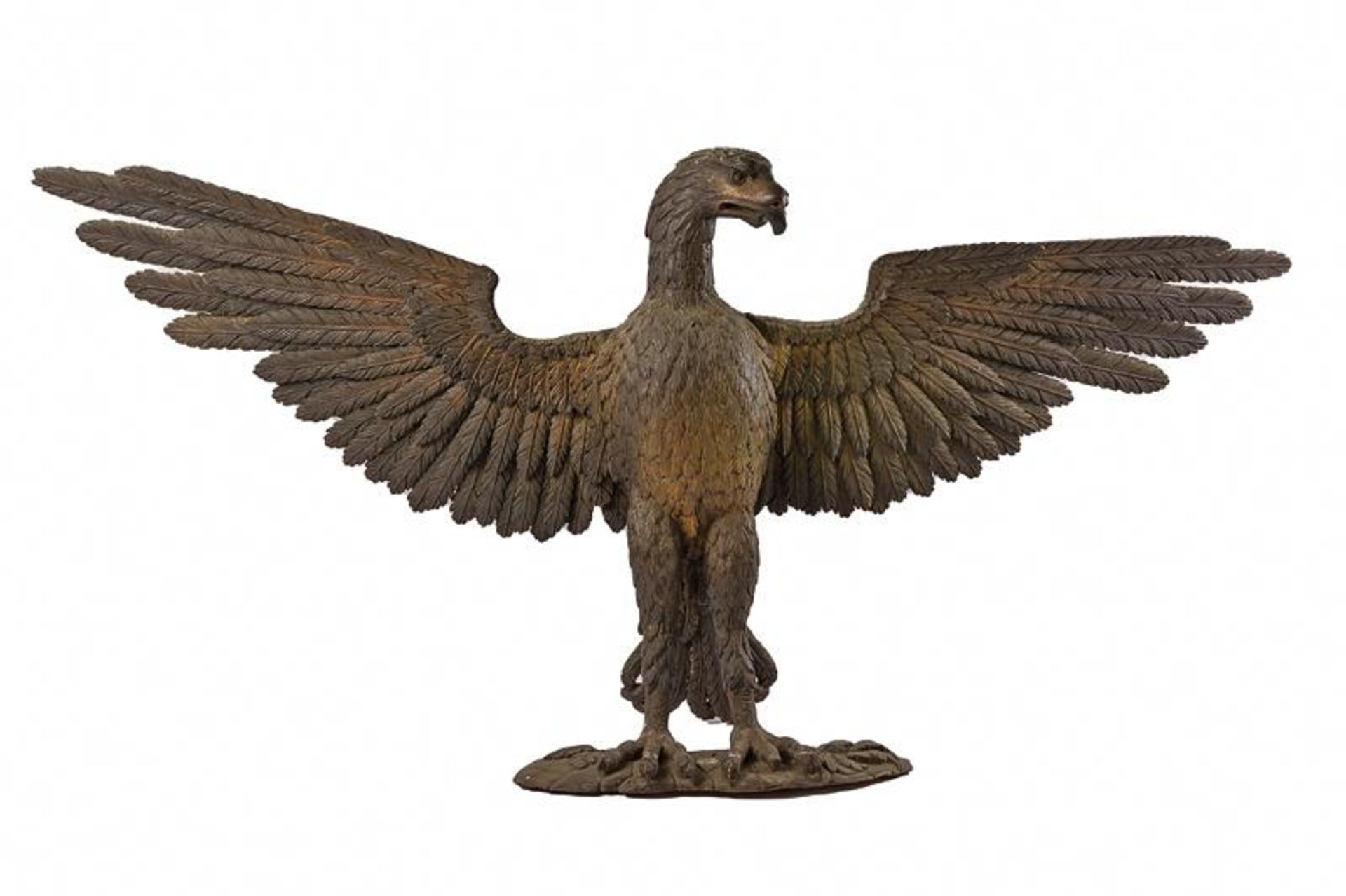 A big wooden sculpture of eagle
