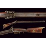 A rare over and under barreled percussion combination rifle/shotgun by J. Harder