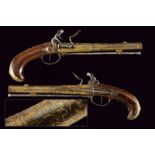 A rare engraved and gilded pair of Queen Anne flintlock pistols by G. Massin
