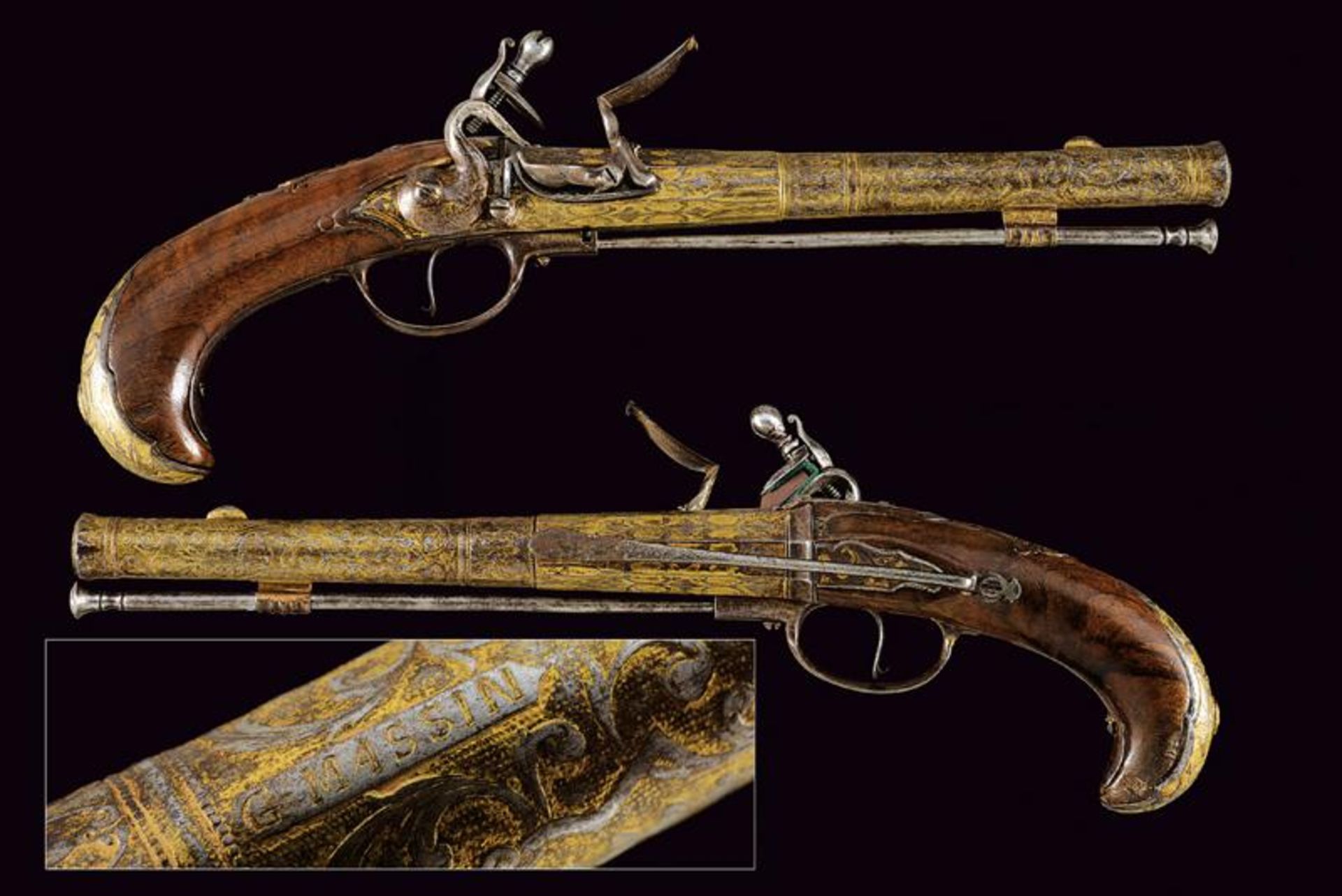 A rare engraved and gilded pair of Queen Anne flintlock pistols by G. Massin