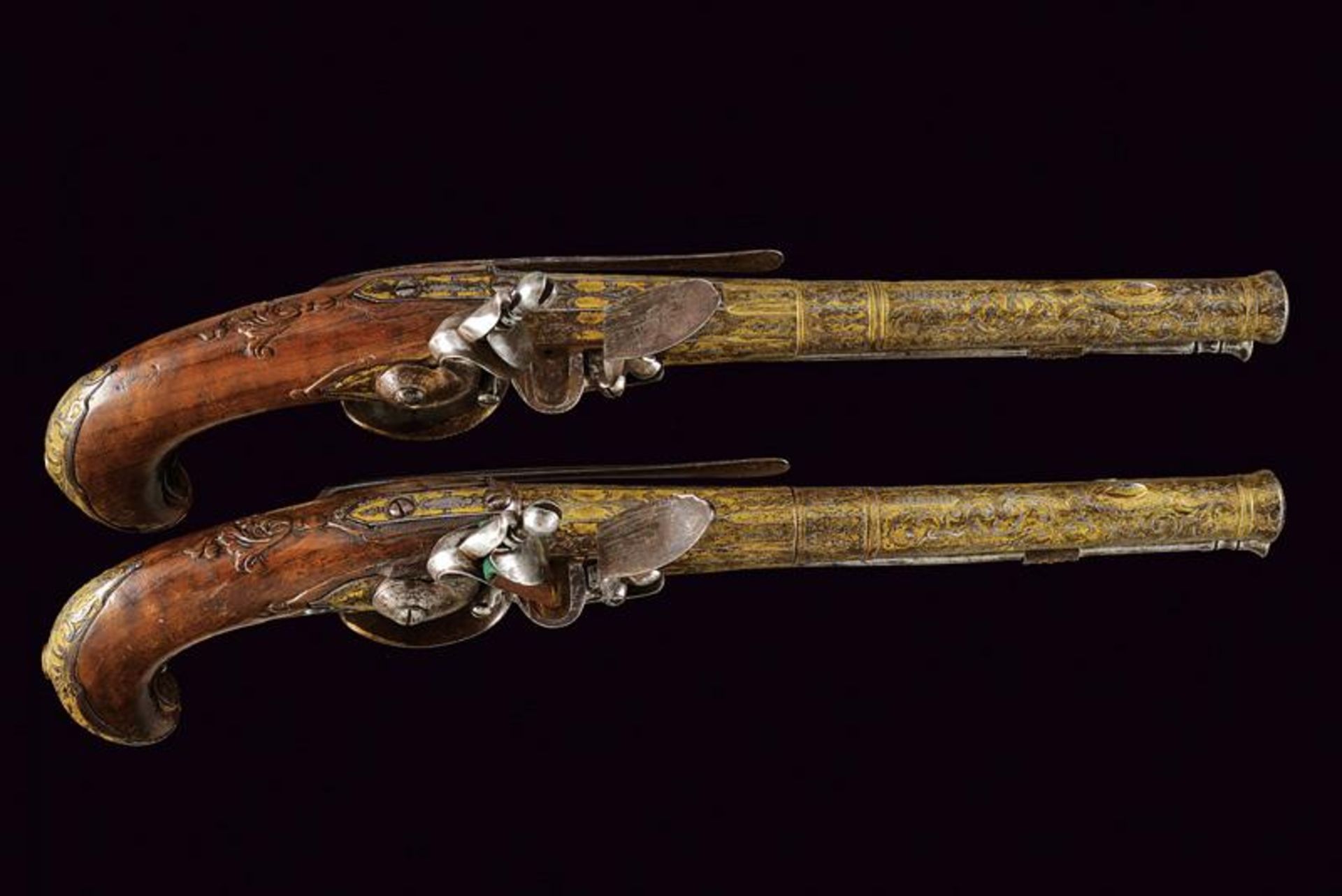 A rare engraved and gilded pair of Queen Anne flintlock pistols by G. Massin - Image 5 of 13
