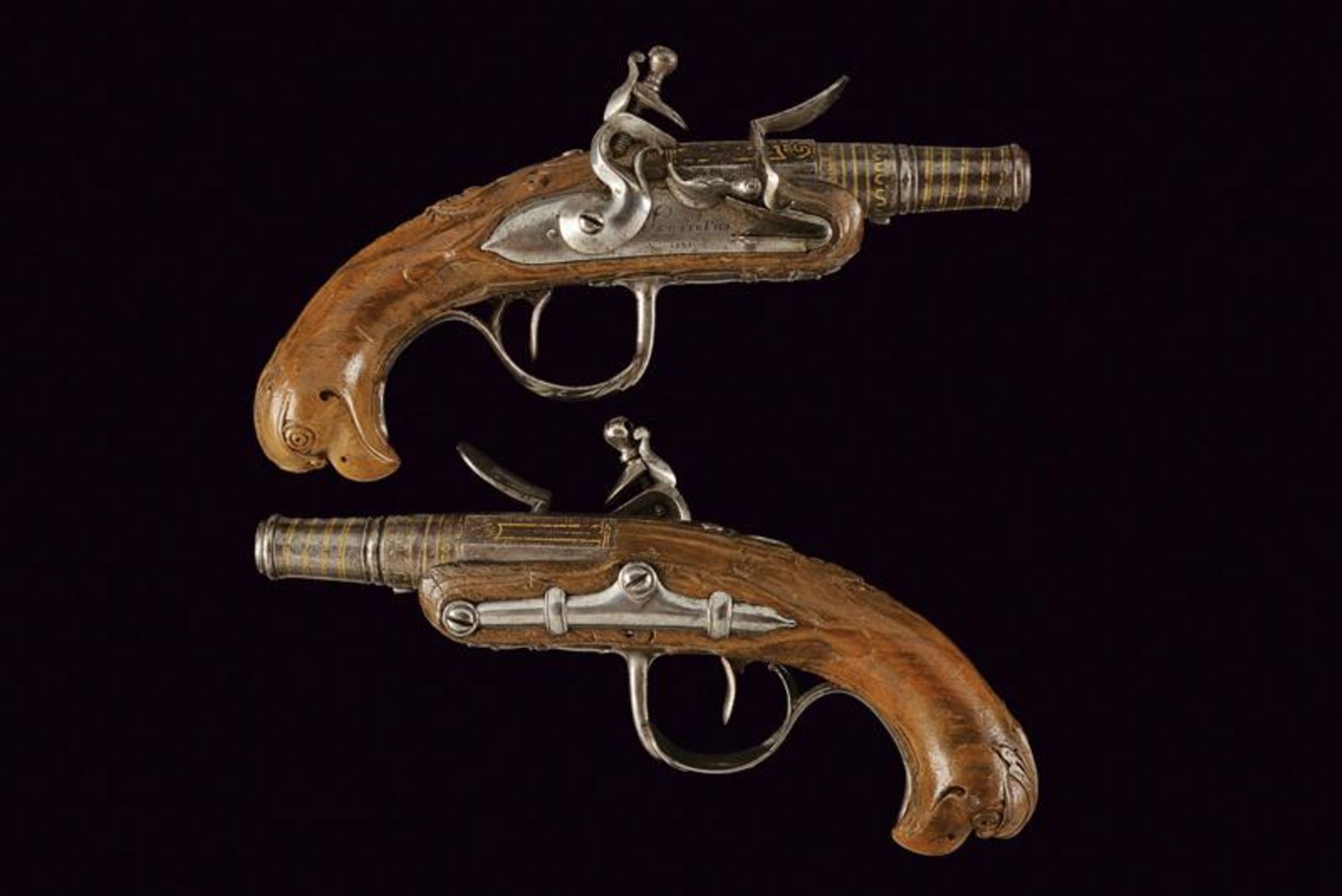 A fine pair of travel flintlock pistols by Lamotte Fils