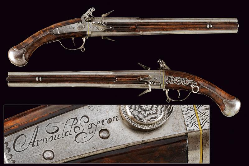 A very scarce pair of flintlock Wender pistols by Arnould Soyron