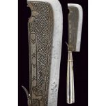A ceremonial axe with silver hilt