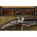 A cased George Gibbs double barreled rifle