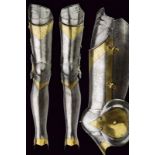 An extremely rare pair of gothic leg harness with brass mounts