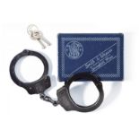 A pair of S&W hand cuffs