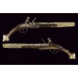 A pair of silver mounted flintlock pistols