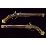 An important pair of miquelet flintlock pistols by Geronimo Fernandez