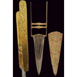 A gilded katar