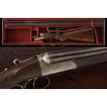 A cased Jeffrey double barreled shotgun