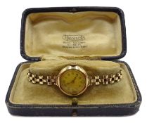 9ct gold Visible wristwatch Glasgow 1937, on rolled gold expanding bracelet,