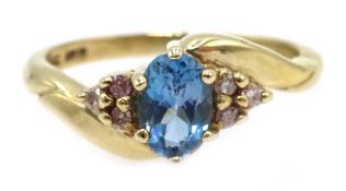 9ct gold blue topaz and diamond ring, hallmarked Condition Report Approx 2gm,