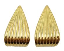 Pair of 18ct gold ridged leaf ear-rings stamped 750, 7.