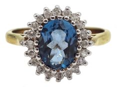 Blue topaz and diamond cluster ring hallmarked 9ct Condition Report size N-O<a