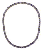 Gold tanzanite and diamond necklace stamped 14K 585,
