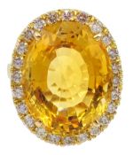 Large oval citrine and diamond cluster ring stamped 18K, citrine approx 20 carat,