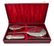 Silver backed four piece dressing table set, bevel edged mirror,
