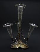 Edwardian silver-plated epergne having four etched glass trumpet flutes,
