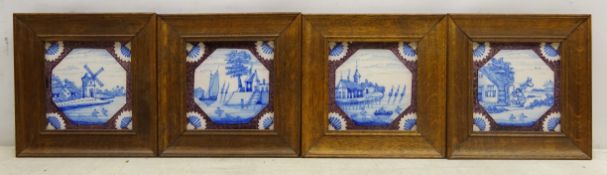 Four 18th century Delft tiles, painted with landscapes,