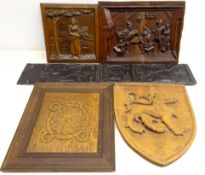 Oak shield-shaped armorial carved in relief with a lion rampant, H36cm,