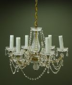 Six light chandelier, central glass column supporting six scroll branches,