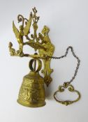 Cast brass Monastery type bell inscribed 'Vocem Meam Audit Qui Me Tangit' on wall bracket,