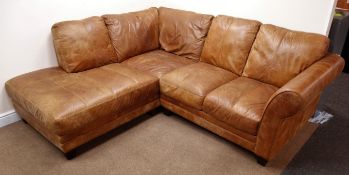 Four seat corner sofa upholstered in tan leather,