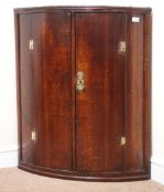 19th century oak wall hanging corner cupboard, two doors enclosing single shelf, W79cm, H92cm,
