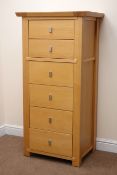 Ponsfords of Sheffield light oak pedestal chest, six graduating drawers, stile supports, W70cm,