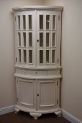 Painted bow fronted floor standing corner cabinet,