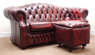 Three seat Chesterfield sofa arched back, upholstered in deep buttoned Burgundy leather,