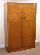 Mid 20th century figured mahogany double wardrobe, two doors enclosing fitted interior,