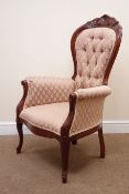 Victorian style mahogany framed armchair, upholstered in deep buttoned salmon coloured fabric,