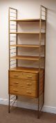 Staples Laddarax teak wall unit, gold painted metal frame, chest with three drawers, four shelves,