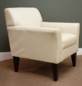 Beige leatherette upholstered armchair, ebonised tapering supports,