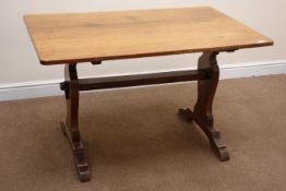 Oak rectangular stretcher table, shaped solid end supports,