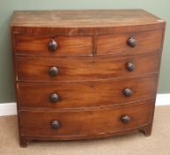 Early 19th century mahogany bow front chest, two short and three long drawers on bracket feet,