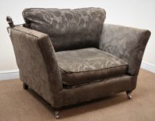 Knole drop side snuggler armchair, upholstered in a purple and grey fabric,